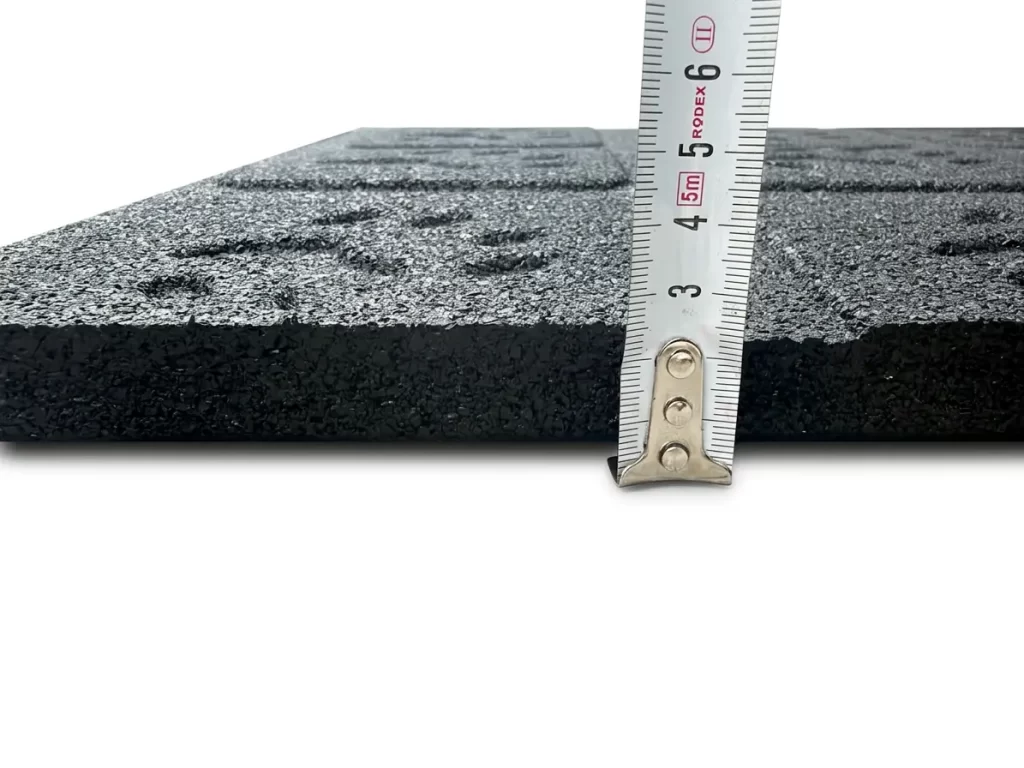 Measuring thickness of heavy-duty 8mm vulcanised rubber mat for farm facilities.